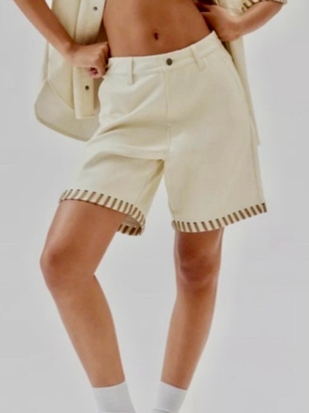Honor The Gift Vegan Leather Bermuda Shorts Cream w/ tan laser-cut striped hem.